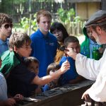 Students watching blacksmithing demonstration