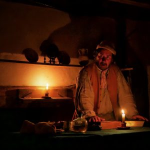 Haunted Henricus Interpreter Telling Story at Night